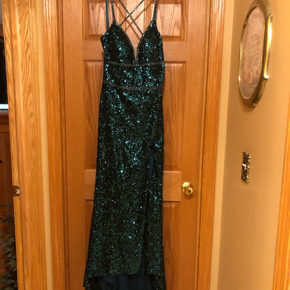 Emerald green sequined dress.  Size 14
$200